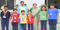 school kids are with medals