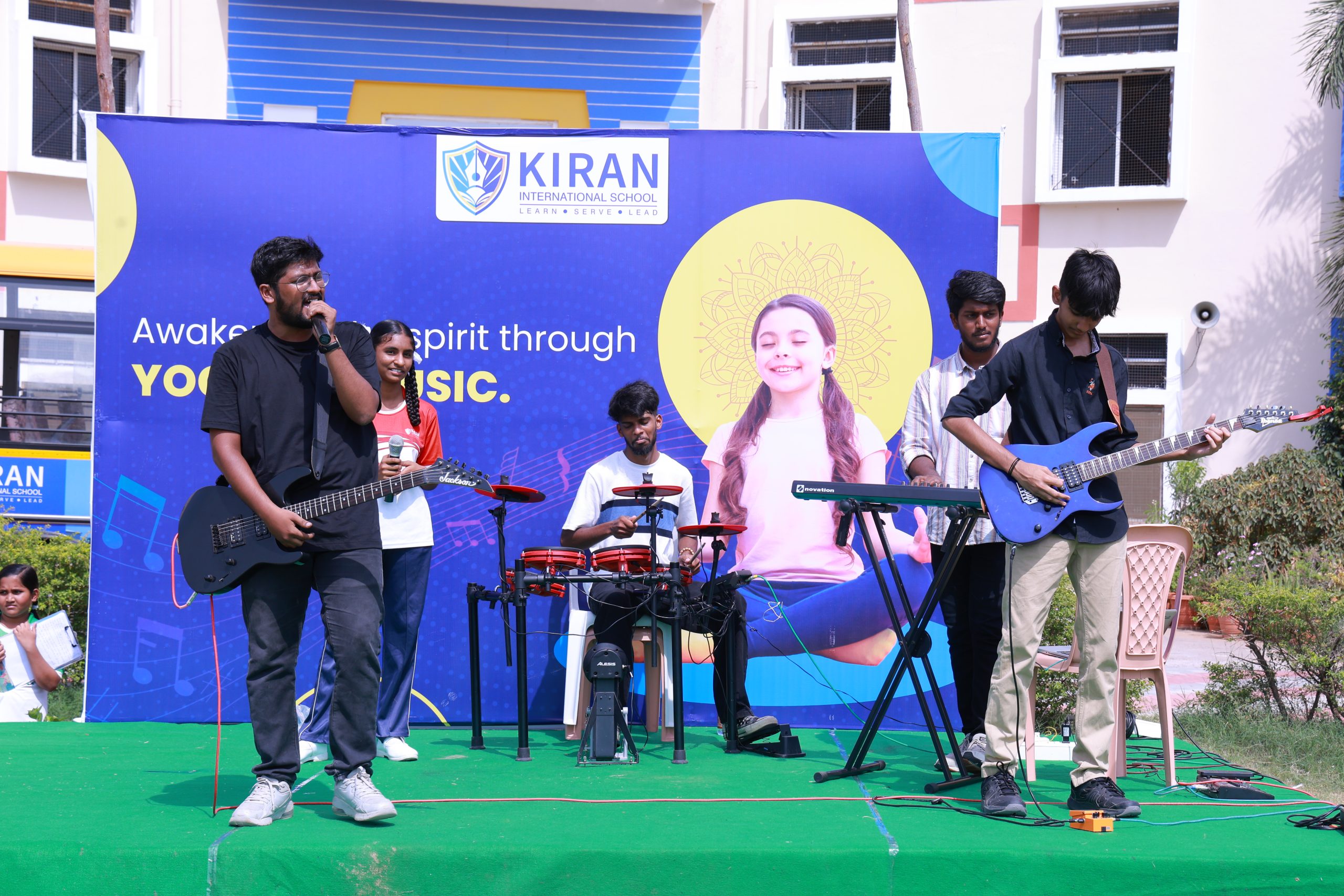 Kiran International school's banner