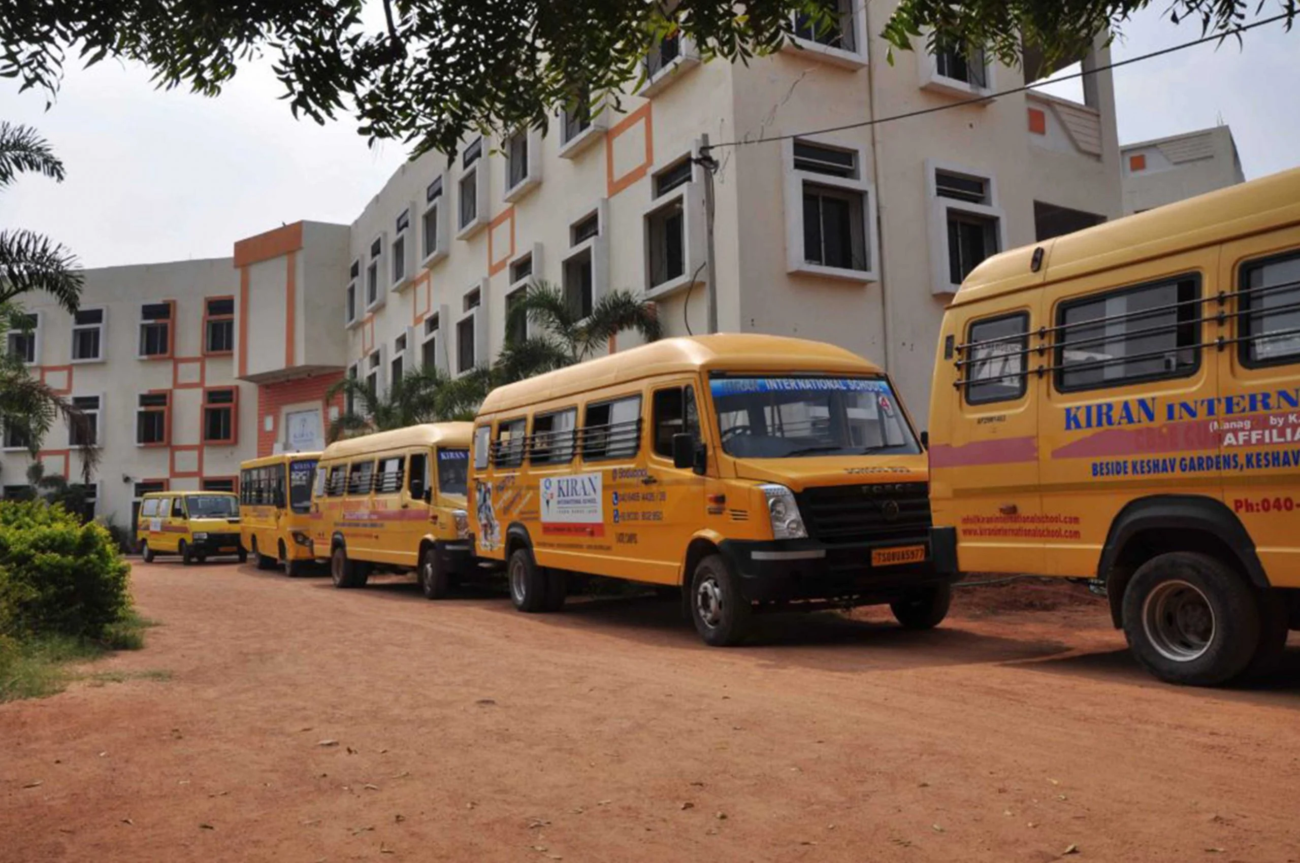 School buses are parked in school