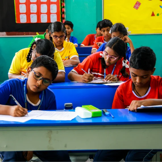 school kids are writing exam in classroom