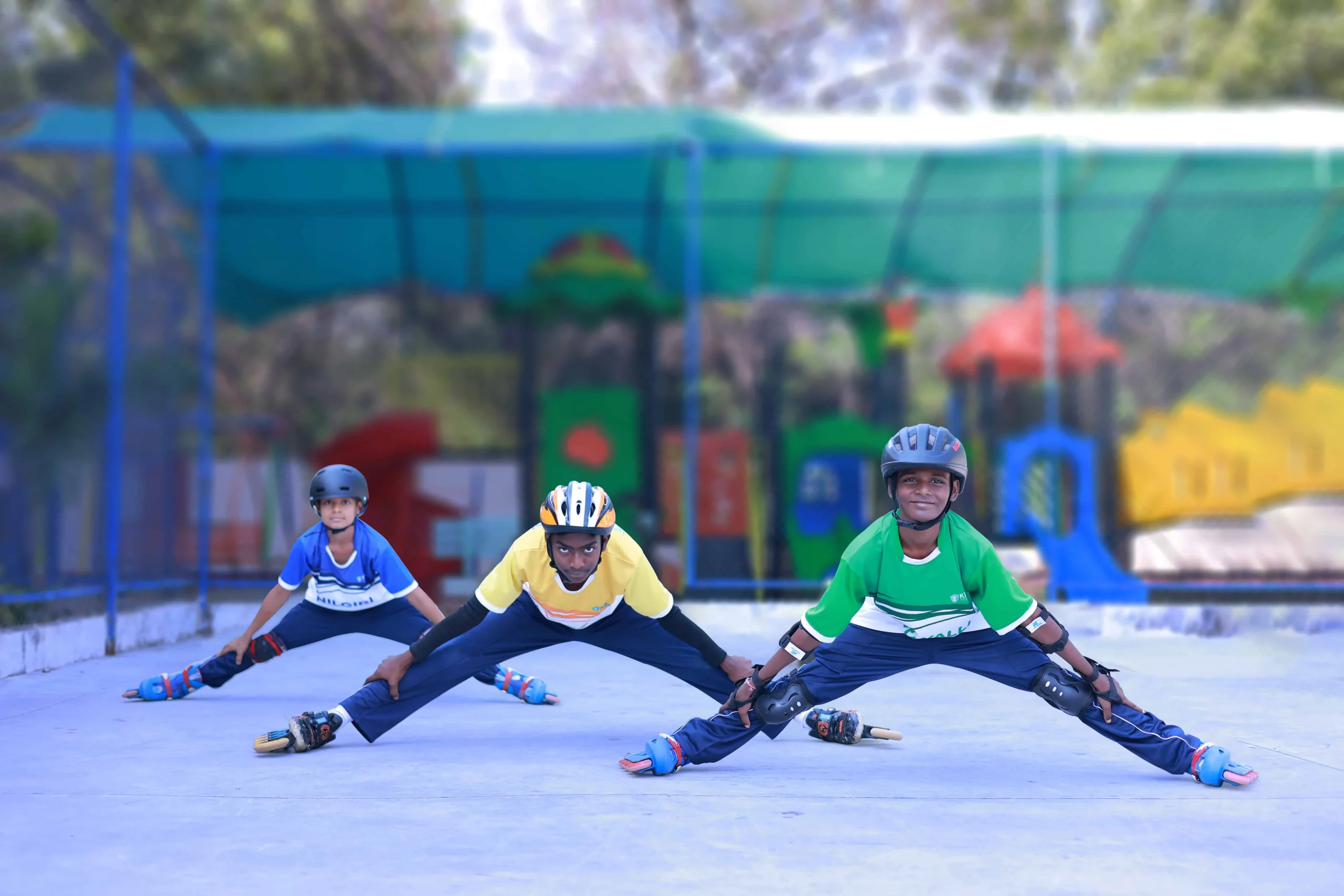 An action-packed moment captured during a skating session, showcasing the thrill and skill of individuals enjoying the sport on a smooth surface.