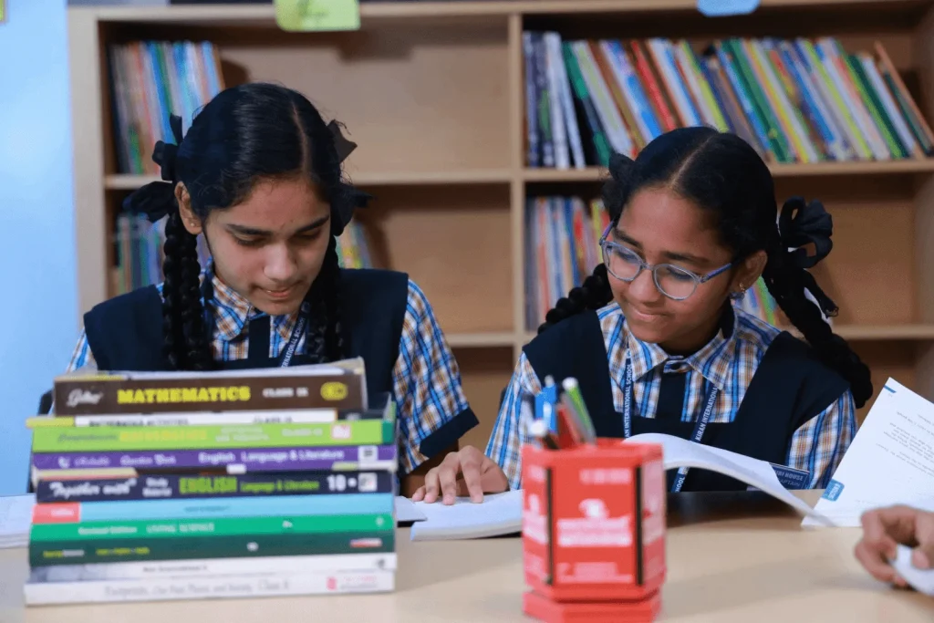 students reading in library