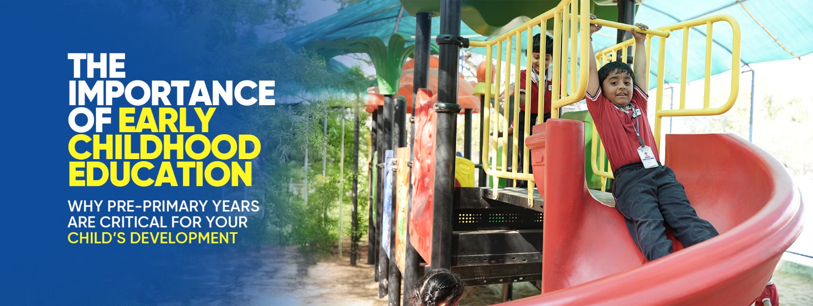 Child playing on a colorful playground slide, highlighting the importance of early childhood education and development at Kiran International School.